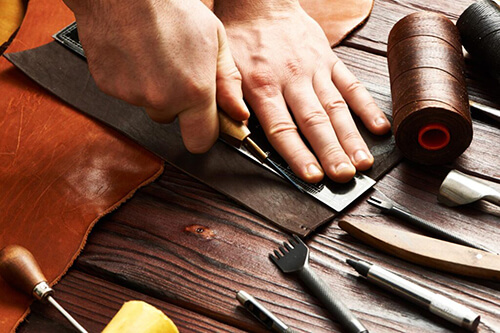 Person Working With Leather